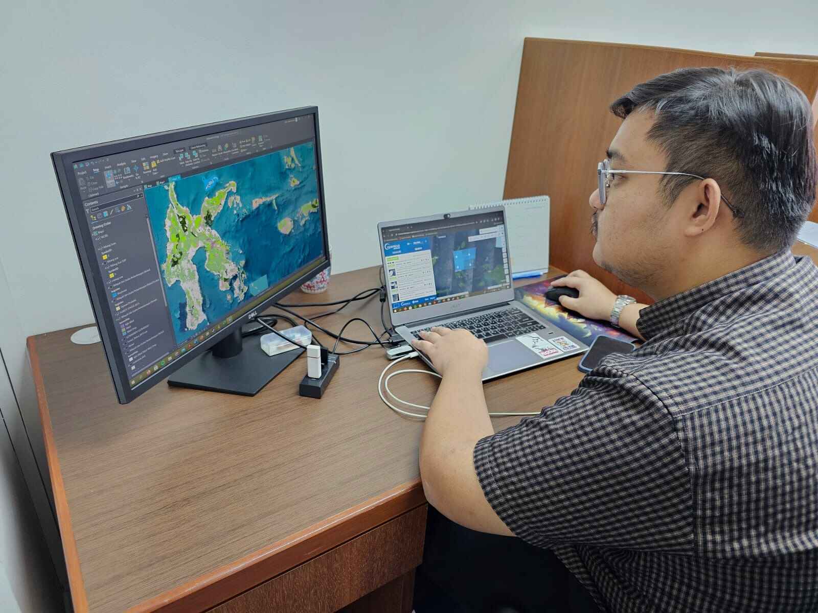 A group of smiling people in a forest environment